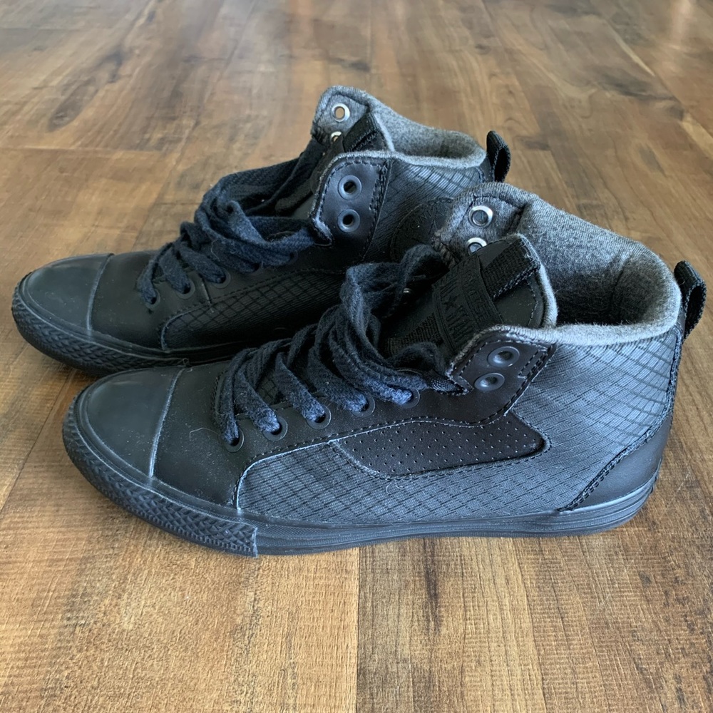 Converse black leather high top sneakers. Kids size 4.0